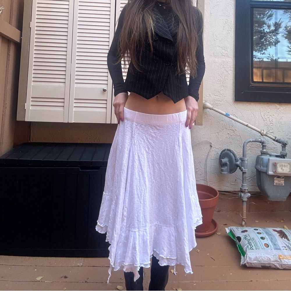 FP WHITE SKIRT WORN ONCE GREAT CONDITION. SMALL SPOT PICTURED.